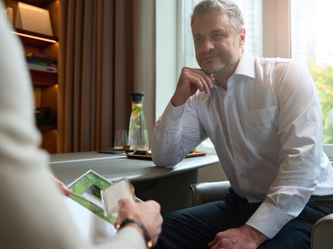Financial adviser listening as a client explains their circumstances